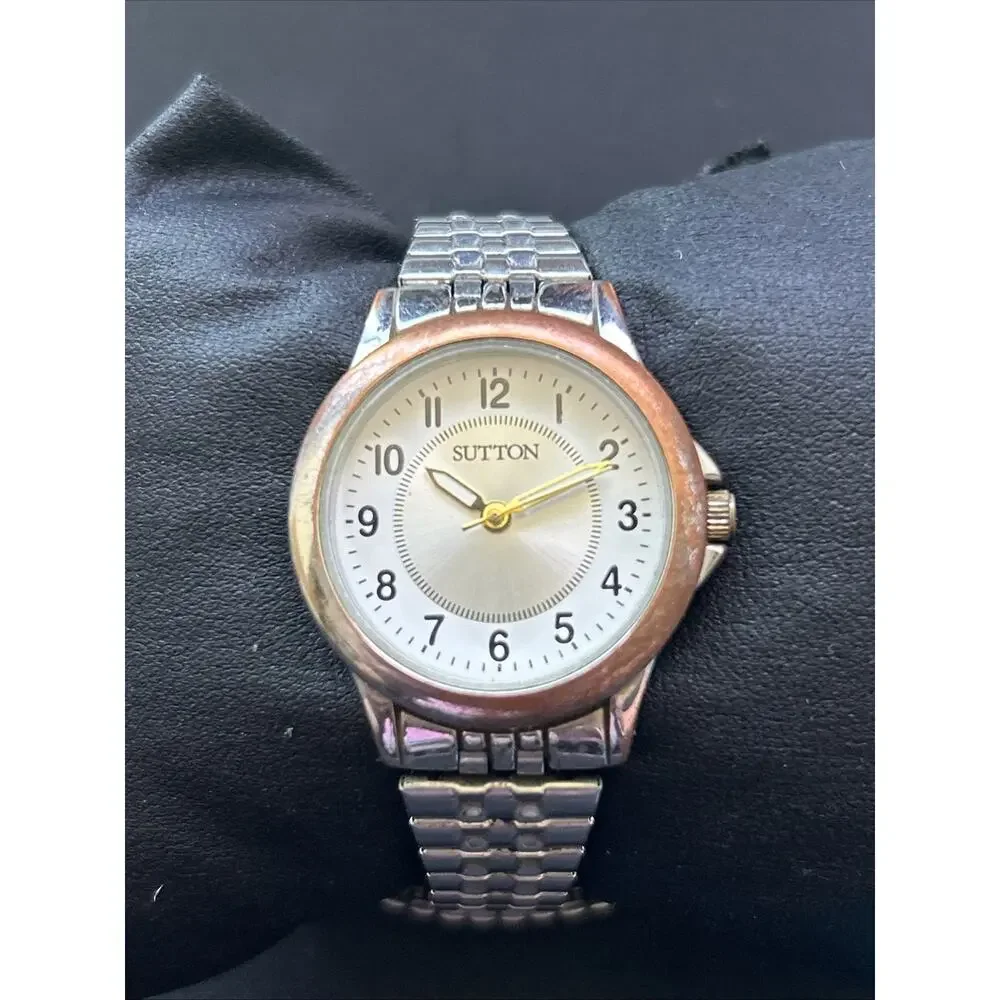 Sutton Silver Tone Worn Bronze Tone Bezel Women’s Stretch Band Quartz Watch